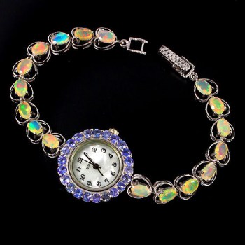 Zilveren horloge gezet met Tanzaniet en facet Ethiopische Opalen