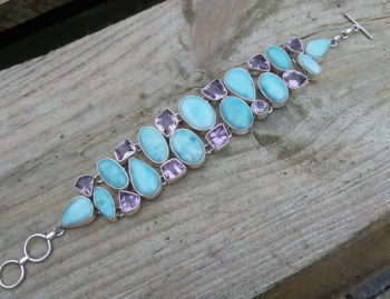 Zilveren armband gezet met Larimar en Amethisten