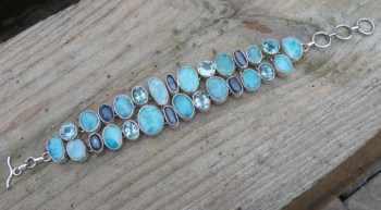 Zilveren armband gezet met Larimar, Kyaniet en Topaas