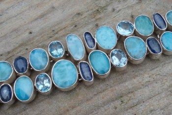 Zilveren armband gezet met Larimar, Kyaniet en Topaas