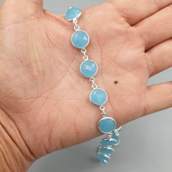 Zilveren ketting rond om gezet met ronde facet blauw Chalcedoon