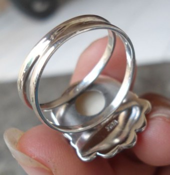 Zilveren ring met gezicht uit been en Turkoois
