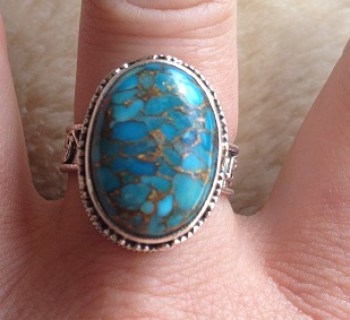 Zilveren ring met koper blauw Turkoois in bewerkte setting maat 