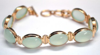 Vergulde zilveren armband met ovale aqua Chalcedoon schakels