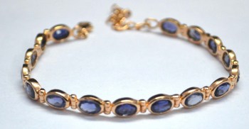 Vergulde zilveren armband met facet Ioliet schakels