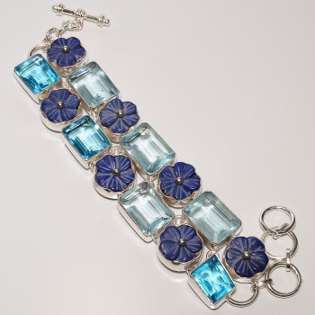 Zilveren edelsteen armband met blauw Topaas en bloem uit Lapis