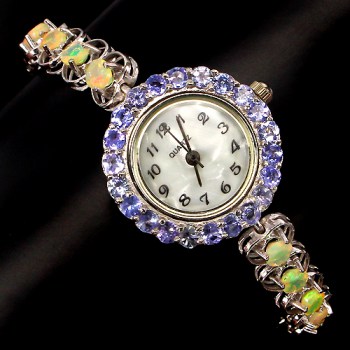 Zilveren horloge gezet met Tanzaniet en facet Ethiopische Opalen