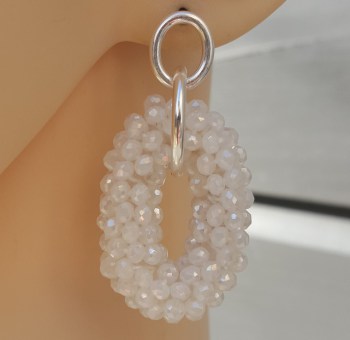 Zilveren oorbellen met ovale hanger van witte kristallen