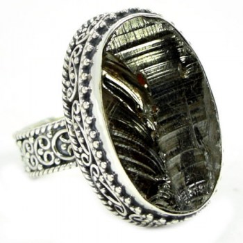 Zilveren ring met Shungiet gezet in bewerkte setting 19 mm
