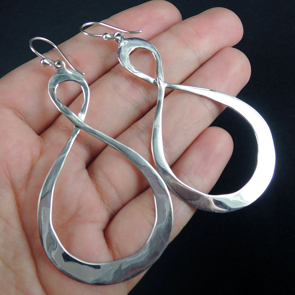 Zilveren oorbellen met groot Infinity teken Verkocht
