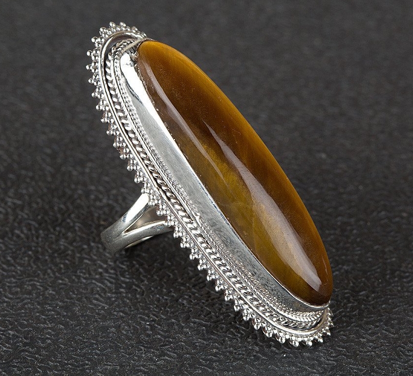vat Bevestiging Wafel Zilveren ring met Tijgeroog en bewerkte kop | Zilveren Edelsteen Ringen